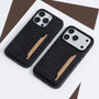 Two crocodile-embossed phone cases with integrated card pockets shown in black, displayed on a white and brown background.