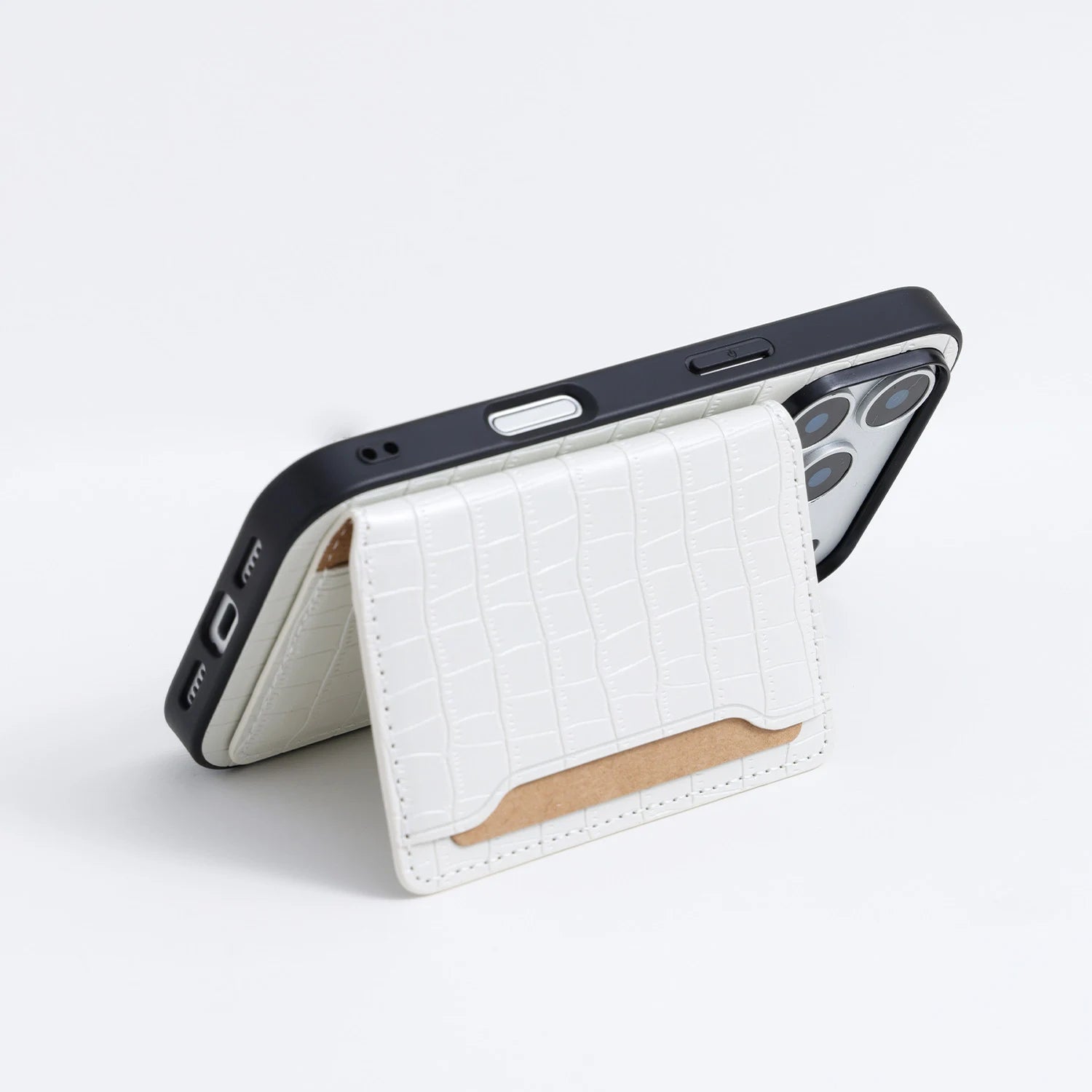 Black crocodile-embossed phone case with the card pocket panel opened to reveal the inner wallet-style construction.