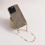Pearl and white quartz phone strap with gold star charm