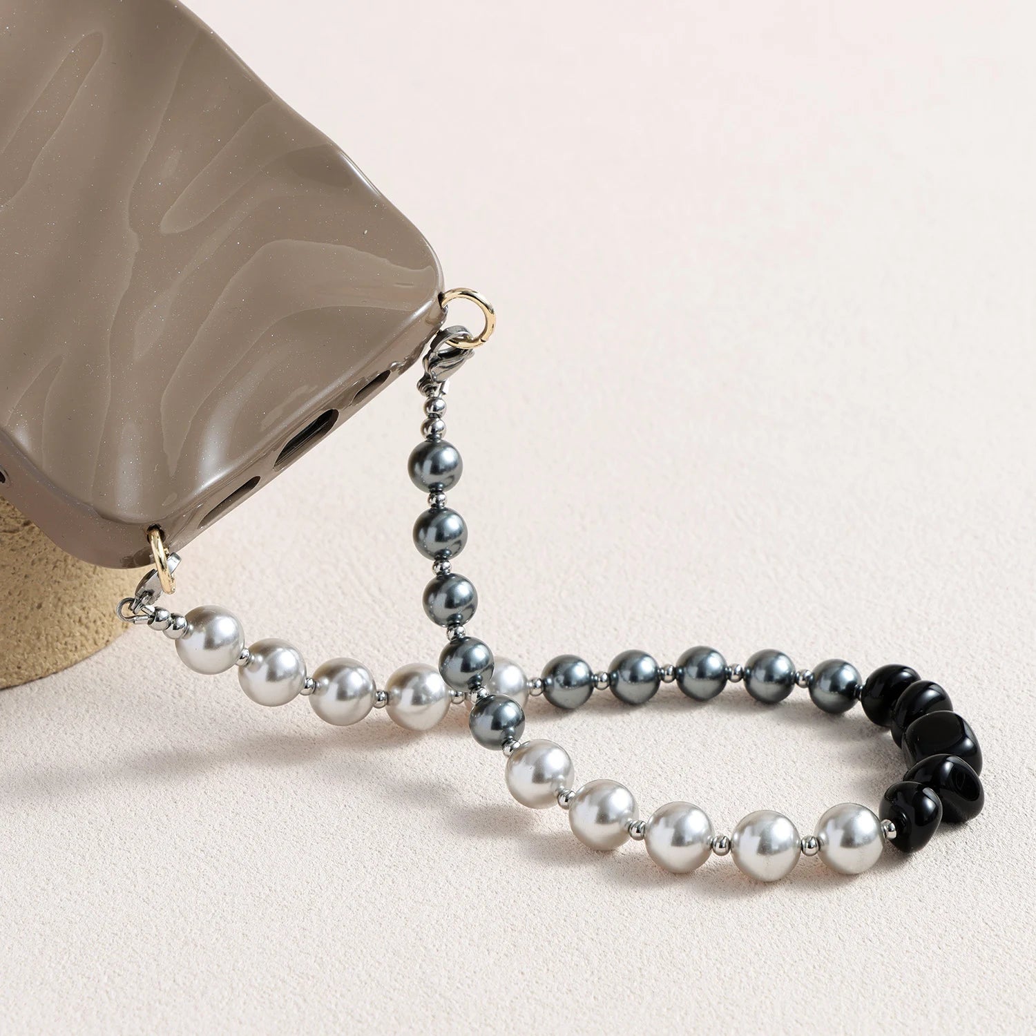Black pearl and silver phone strap with mixed natural stones and detachable bracelet design