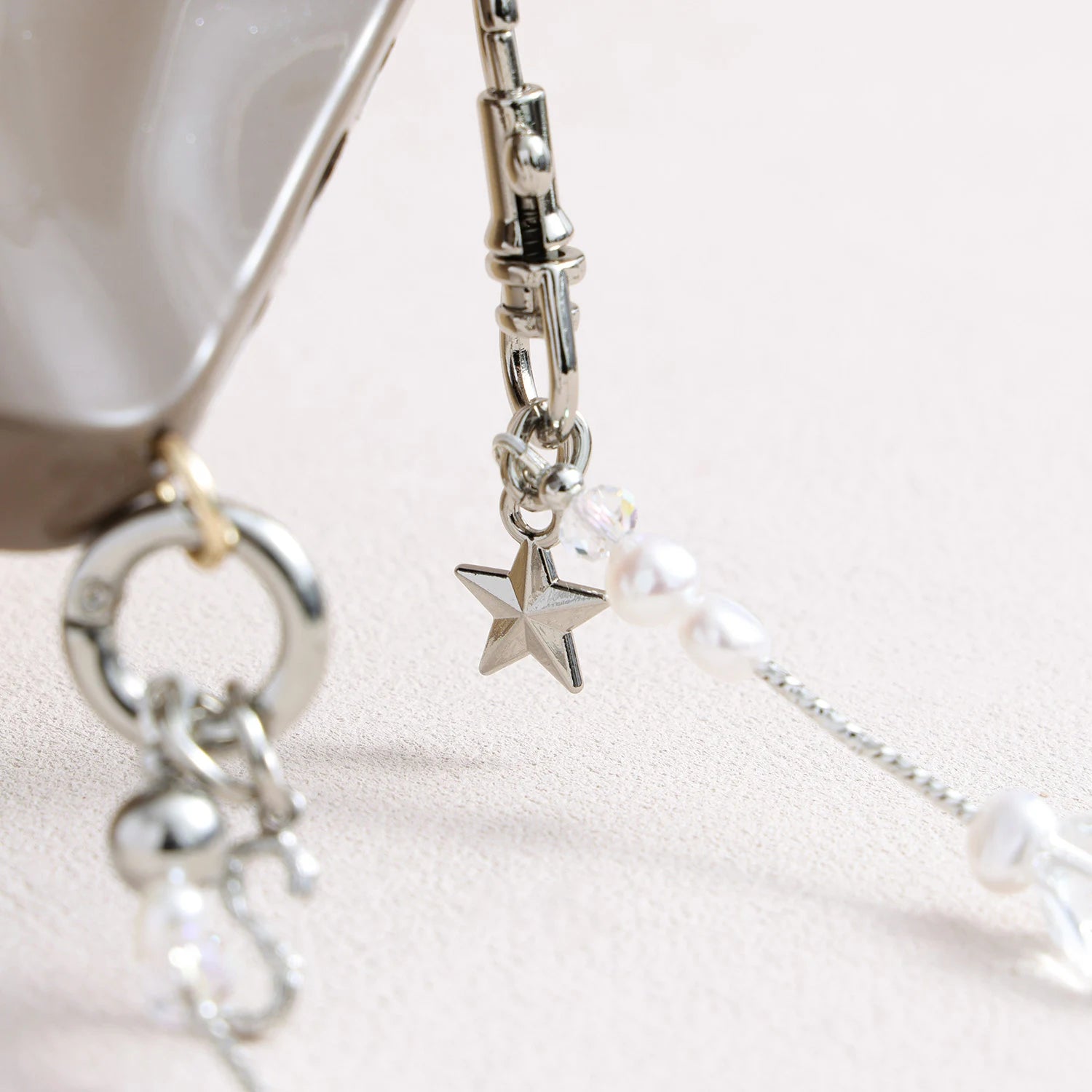 Pearl and white quartz phone strap with gold star charm
