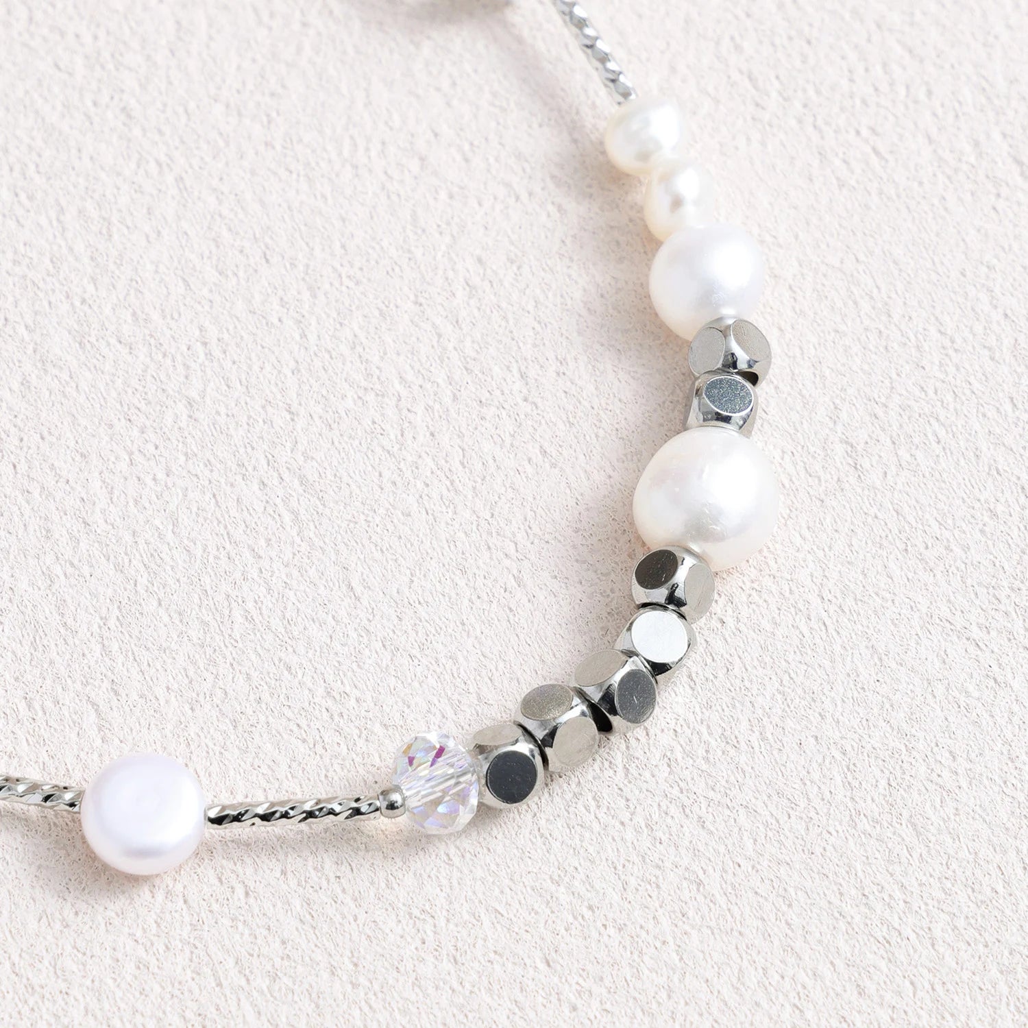 Pearl and white quartz phone strap with gold star charm