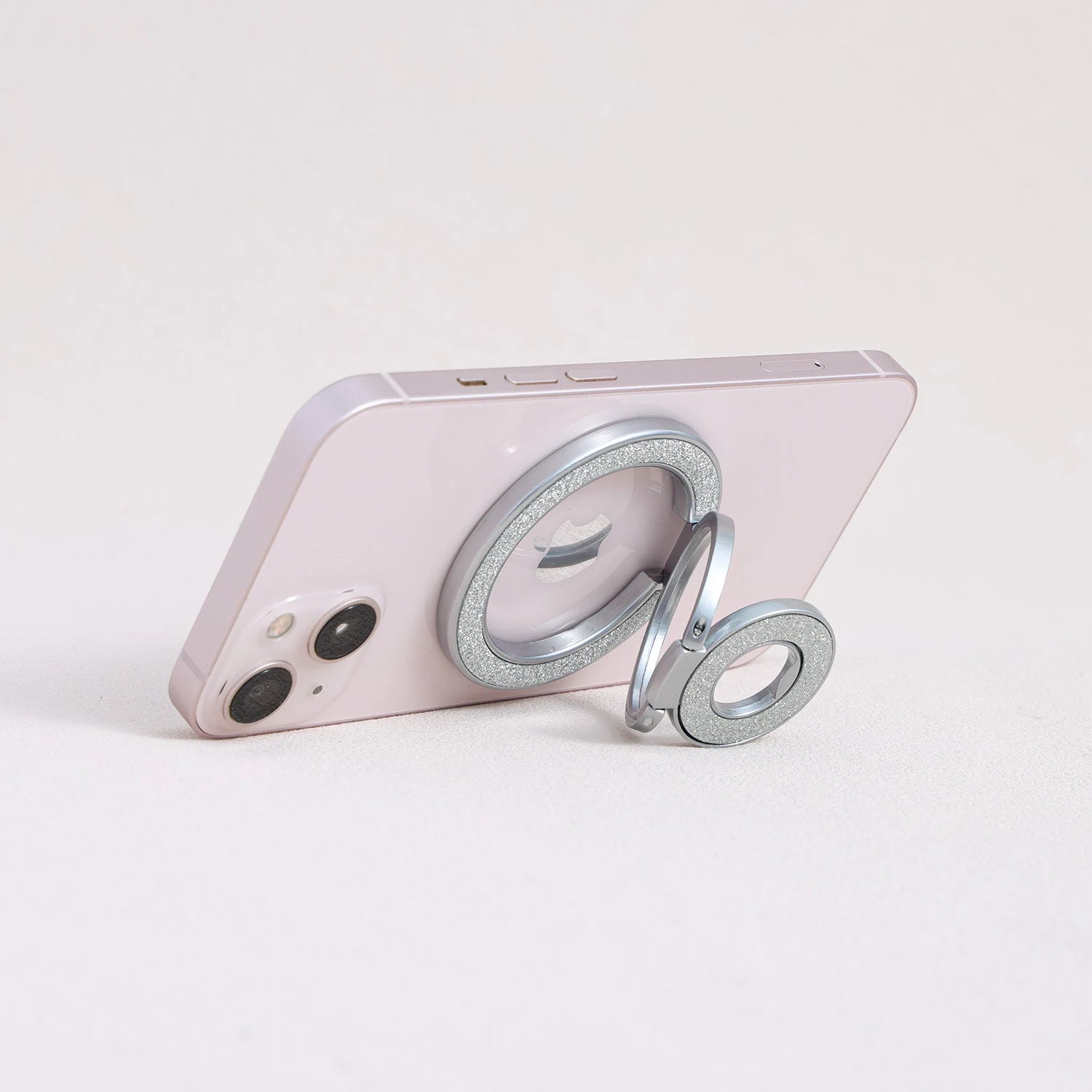 Silver MagSafe telescopic phone ring stand with glitter inlay, side angle view