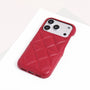 Single scarlet red quilted leather phone case fitted on a phone.