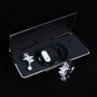 Silver-tone star ear charms with clear crystal drop displayed with black Interstella magnetic earphone charging case