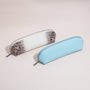 Croc-embossed top-grain cowhide brow pencil case in a slim rectangular silhouette