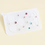 Clear acrylic camera lens protector sheet decorated with multicolor crystals in pink, blue, green, champagne, and clear tones.