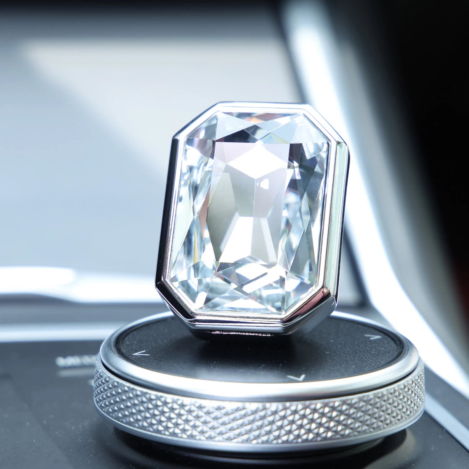 Luxury crystal car Fragrance clipped onto a car air vent with brilliant prism reflections