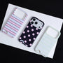 Top view of three Interstella hard-shell card slot phone cases with polka dot and striped patterns