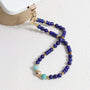 Lapis Lazuli and Amazonite gemstone phone strap with gold metal details, detachable bracelet design