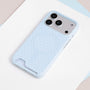 Full view of the powder blue polka dot card phone case with slim PC construction and circular back detail.