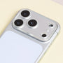 Silver halo acrylic camera lens protector installed on a silver iPhone, highlighting glitter ring borders around each camera lens.