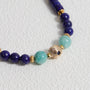 Lapis Lazuli and Amazonite gemstone phone strap with gold metal details, detachable bracelet design