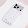 Porcelain white oversized polka dot card phone case with blush-pink dots and integrated card insert design.