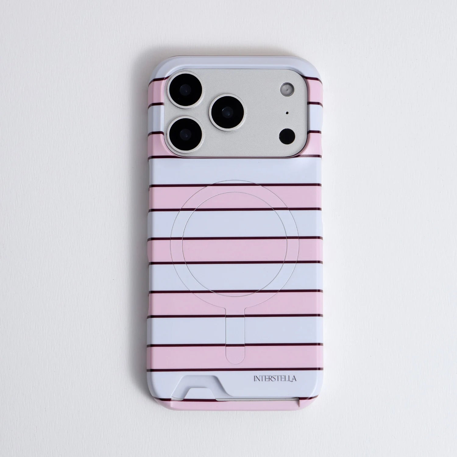 Front view of Interstella pink striped hard-shell phone case with back card holder design