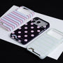 Three Interstella card slot phone cases in polka dot, blush stripe, and mint stripe designs