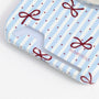 Close-up of the striped bow card phone case bottom section showing the card slot opening, dotted accents, and ribbon motif.