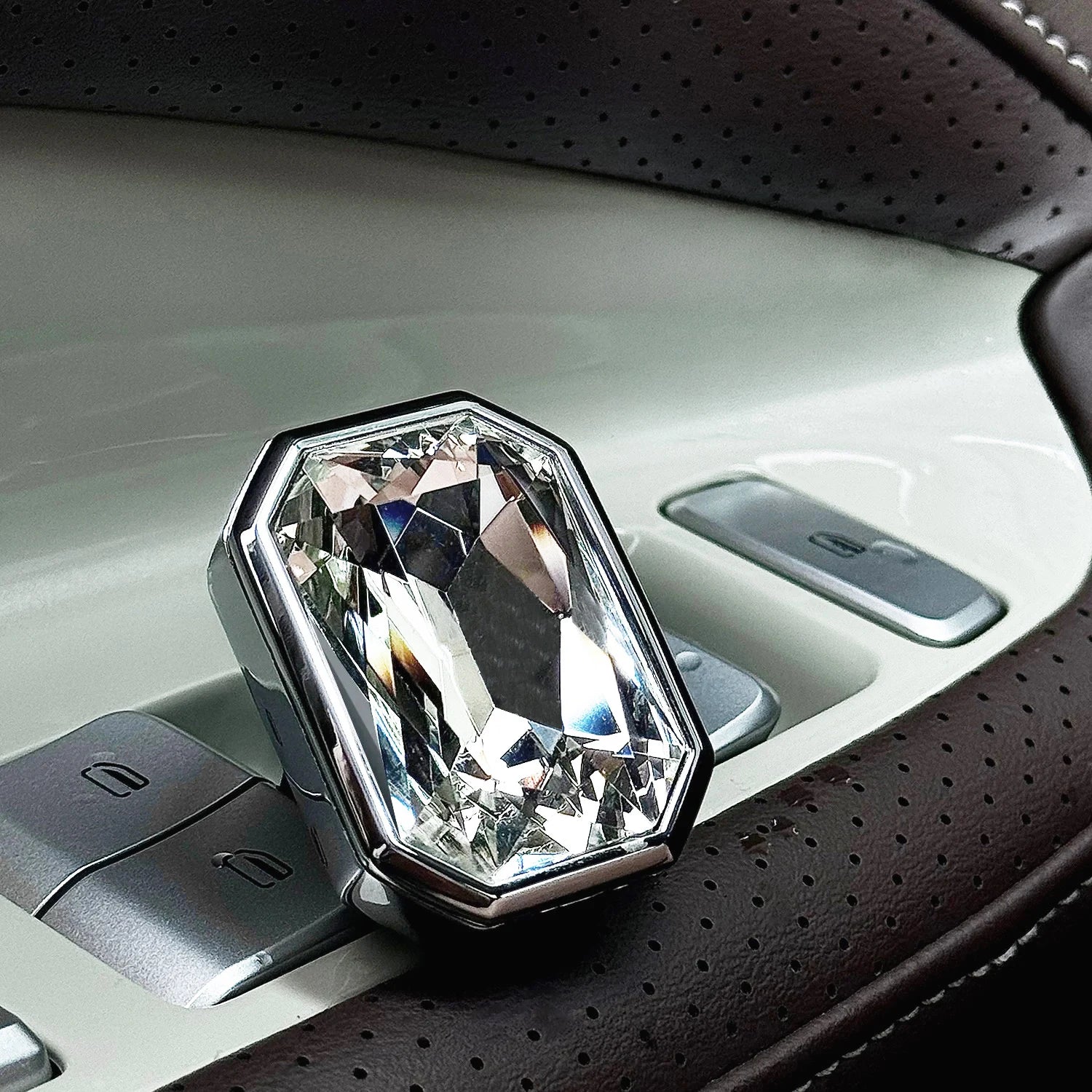 Palladio Prism crystal car diffuser styled on a premium leather car interior with diamond-like faceted shine