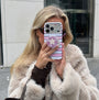 Front view of Interstella polka dot hard-shell phone case with back card holder design