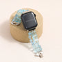 Aquamarine and topaz gemstone Apple Watch band with Swarovski crystal clasp and silver-tone metal details