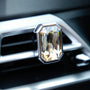 Luxury crystal car Fragrance clipped onto a car air vent with brilliant prism reflections
