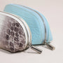 Two slim croc-embossed brow pencil cases displayed side by side in elongated rectangular forms