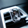 Luxury crystal car Fragrance clipped onto a car air vent with brilliant prism reflections