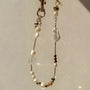 Pearl and white quartz phone strap with gold star charm