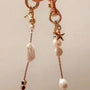 Pearl and white quartz phone strap with gold star charm
