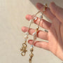 Pearl and white quartz phone strap with gold star charm